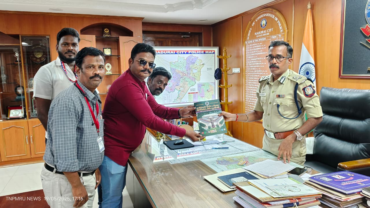 Presenting Sovenir to Madurai District Commissioner